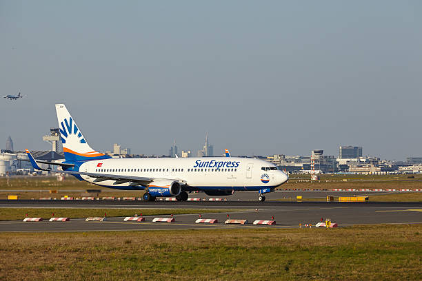 Frankfurt Airport - Boeing 737-800 of SunExpress takes off Frankfurt, Germany - April 23, 2015: A Boeing 737-800 of SunExpress takes off at Frankfurt International Airport (Germany, FRA) on April 23, 2015. sunexpress stock pictures, royalty-free photos & images