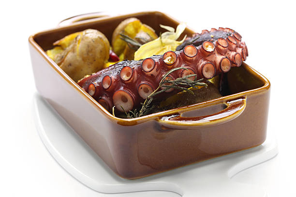 istock grilled octopus with potatoes, Portuguese cuisine 472281654