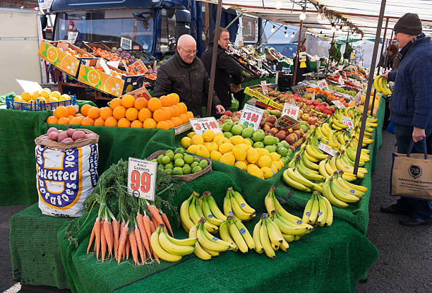 Melton Mowbray, United Kingdom - March 11, 2015: A large and full fruit and vegetable market stall - UK.