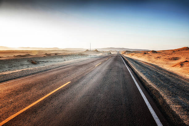 istock Winding road across Peruvian desert 472287168