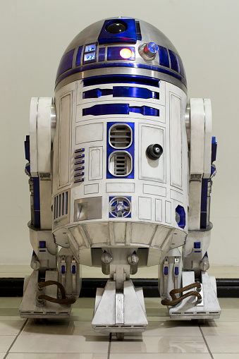 Glen Vine, Isle of Man - May 2, 2015: A full size all metal R2D2 that I built myself, photographed in the utility room of my house prior to being moved to an exhibition in Douglas on the Isle of Man. R2D2 is a fictional robot, from the Star Wars films created by George Lucas.