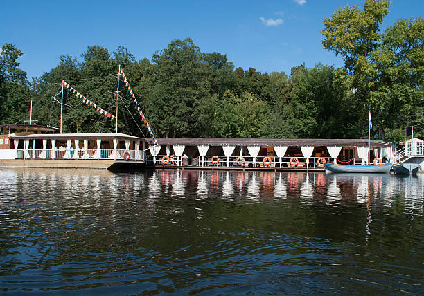 istock Kuzminki Park. Cafe at the pond. 472287864