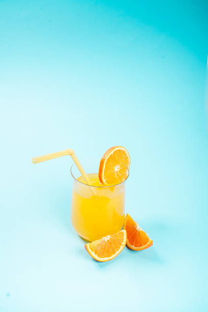 istock Orange juice in glass 472287934