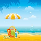 istock Beach landscape with umbrella, bag, sunglasses and cocktail 472290149
