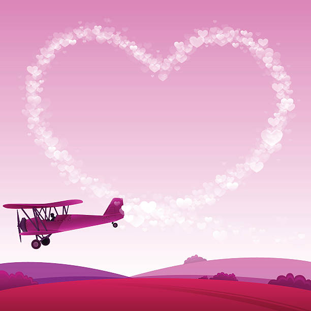 Love Skywriting Biplane skywriting a heart shape. propeller airplane landing stock illustrations