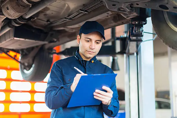 Photo of Mechanic at work in his garage