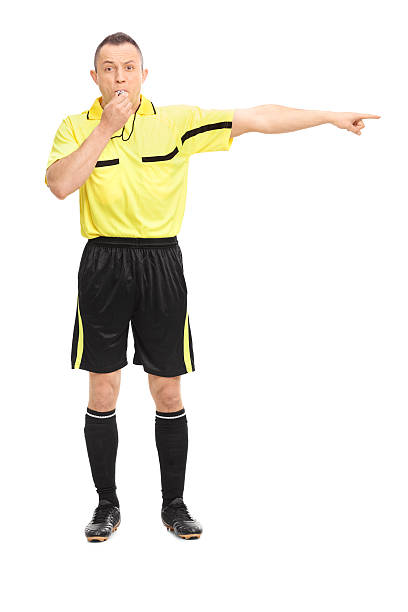istock Angry football referee blowing a whistle 472297374