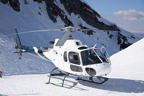 istock White rescue helicopter parked in the mountains 472297398
