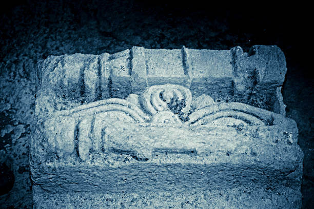 Ruined structure at Panhalekaji caves, famous rock-cut caves are 1000 years Old situated on the bank of the river Kotjai, Near Dapoli, Maharashtra, India.