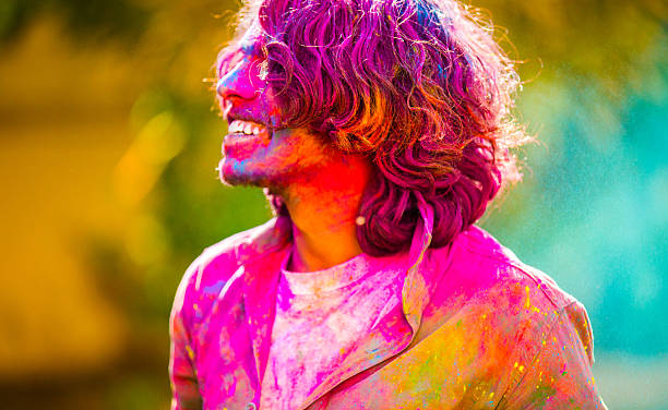 istock Indian man enjoying Holi Festival 472300982
