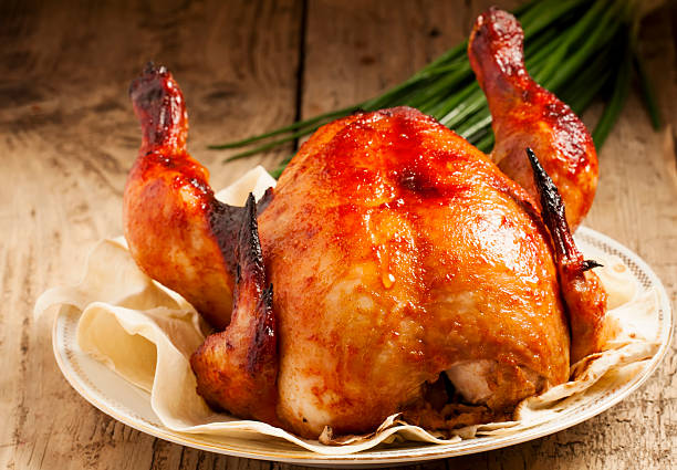 istock baked chicken on a plate with pita bread 472302306