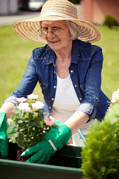 istock Senior women gardening 472307048