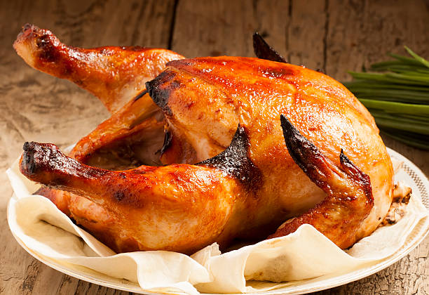 istock baked chicken on a plate with pita bread 472307376
