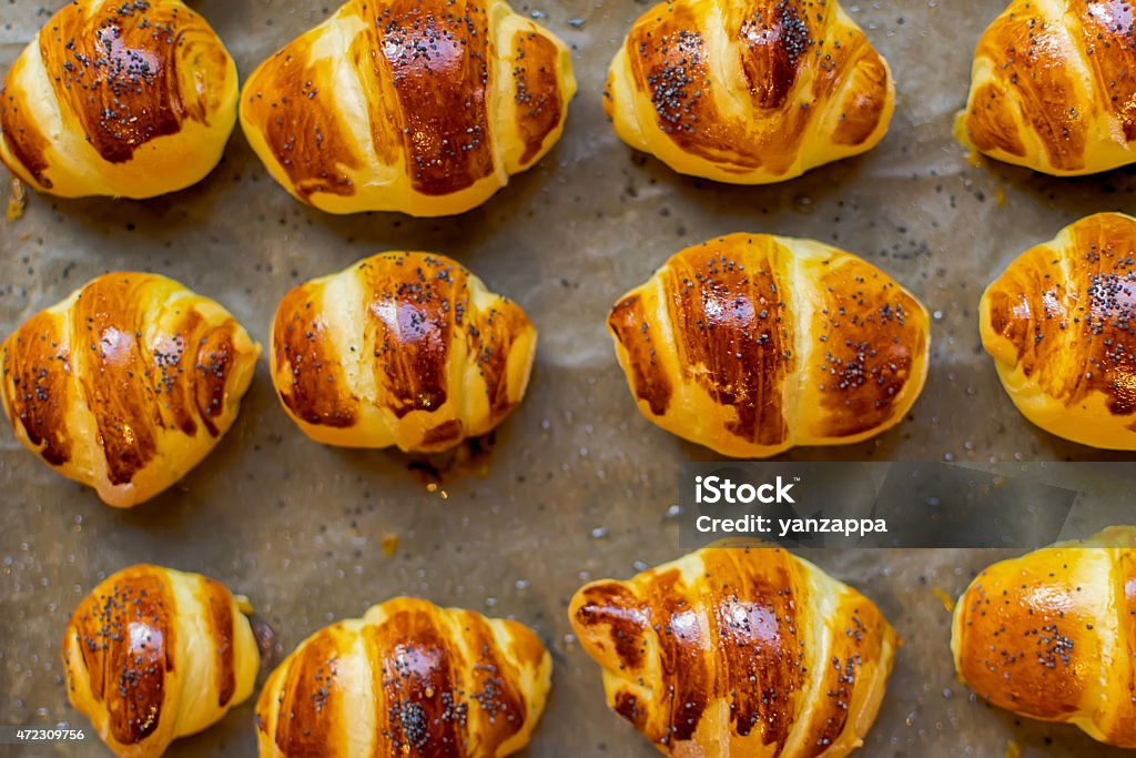 Buns Buns with fillings of delight arranged on a tray after baking 2015 Stock Photo