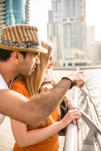 istock togetherness couple in vacations on Dubai Marina - UAE 472310154