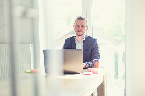 istock Businessman working in a modern office 472311120