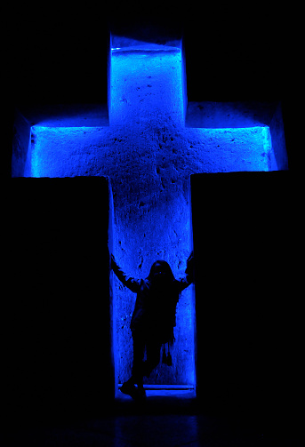 Little girl standing en cruz, catedral de Zipaquirá, Colombia photo