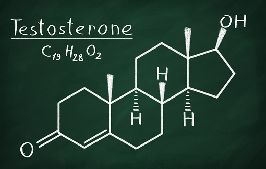 Chemical formula of Testosterone on a blackboard