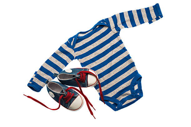 istock Object on white - clothes for baby close up 472311850