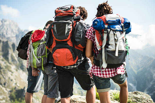 istock group of people standing on the mountain 472314966