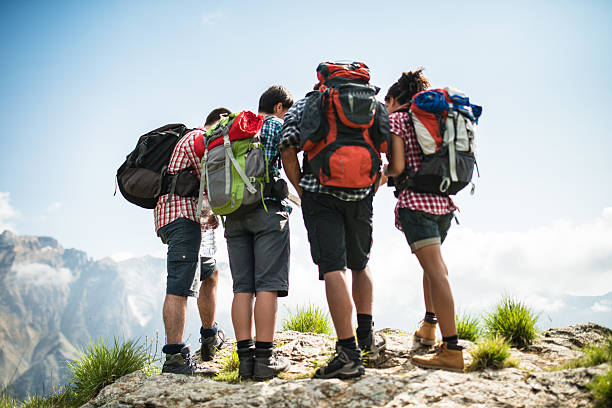 istock group of people standing on the mountain 472314968