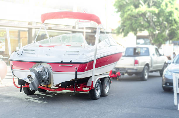 istock speedboat being towed by truck 472315314