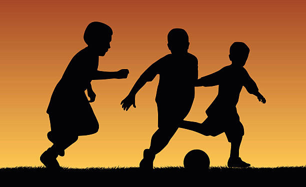 illustrations, cliparts, dessins animés et icônes de joueur de football enfants - soccer child silhouette sport