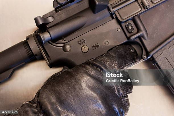 Ar15 Black Gloves Finger Off Trigger Stock Photo - Download Image Now - 2015, AR-15, American Culture