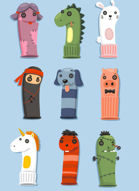 Puppets made of socks Set Puppets made of socks Set with nine different cute puppets in different shape and colors vector illustration cartoon. puppet stock illustrations