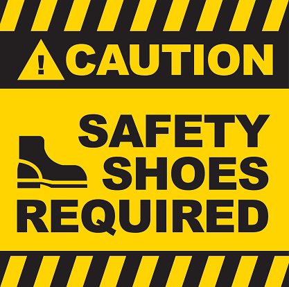 Black and yellow warning sign saying safety shoes required