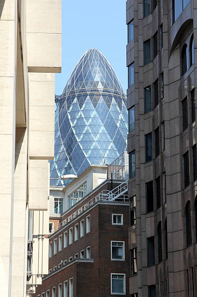 istock The Gherkin enframed by surrounding buildings 472316818