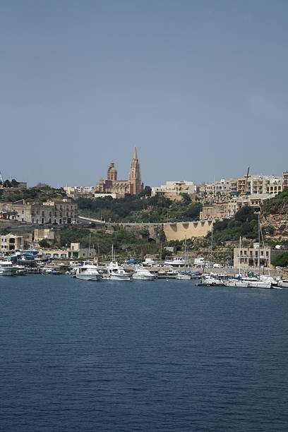 istock Mgarr harbour with Fort Chambray on hill, Gozo, Malta 472318938