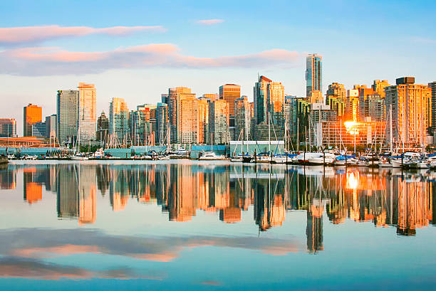 istock Vancouver skyline with Stanley Park at sunset, BC, Canada 472318986