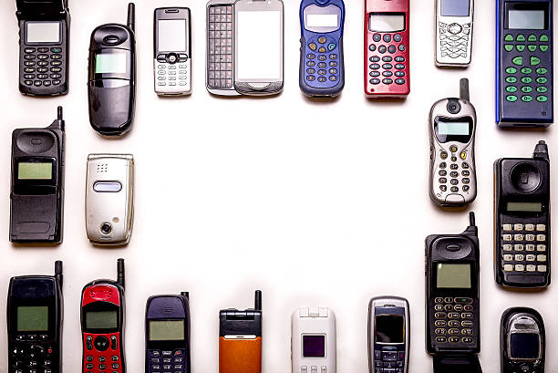 istock old used mobile phones, copy space 472322810