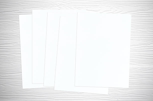 istock Papers on white vintage wood background 472323018