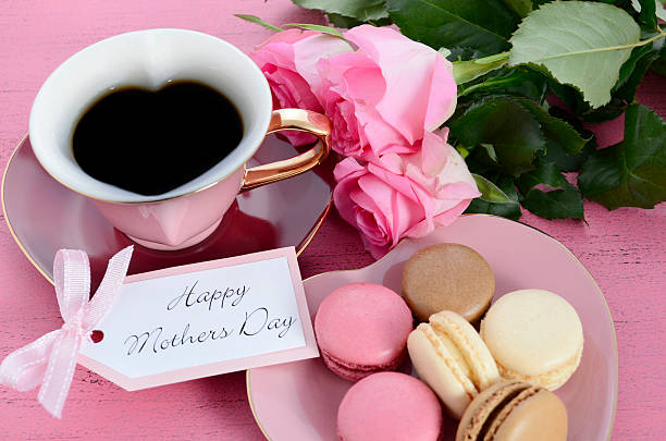 istock Happy Mothers Day Pink Roses and Heart Shape Tea Cup. 472323664