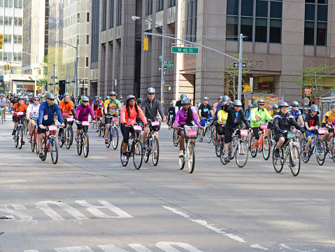 New York, USA. MAY 3, 2015: The Five Boro Bike Tour saw more than 30,000 cyclists of all levels participate in the weekend event which closed city streets all around Manhattan.
