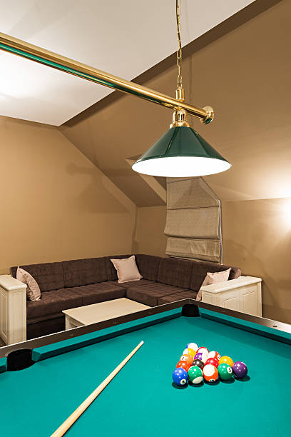 istock Billiard table in luxury living room 472324454