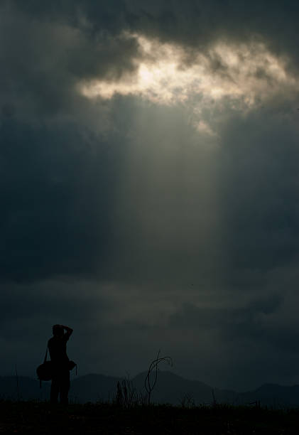 istock silhouette of photographer 472327622