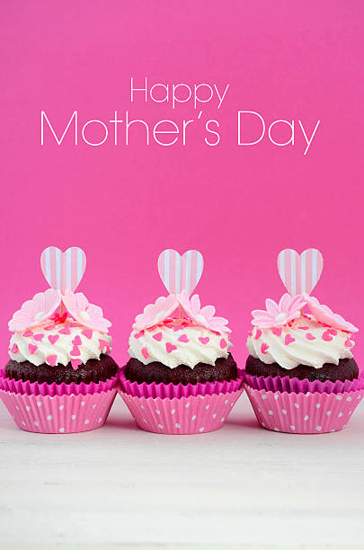 istock Happy Mothers Day pink and white cupcakes. 472328086