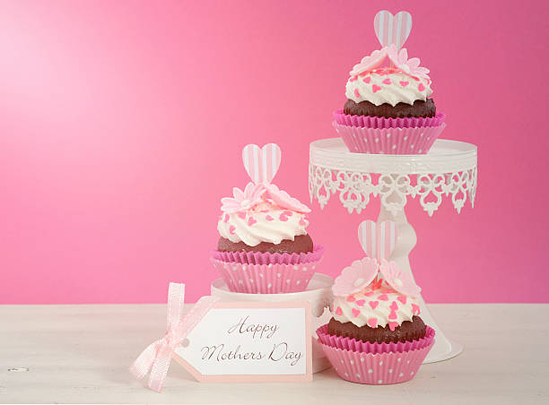istock Happy Mothers Day pink and white cupcakes. 472328244