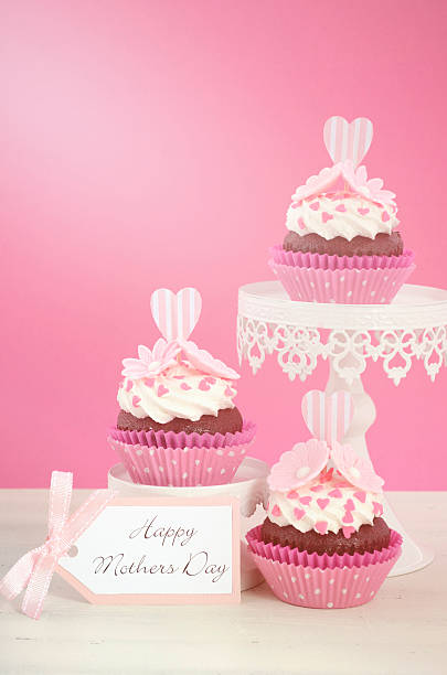 istock Happy Mothers Day pink and white cupcakes. 472328338