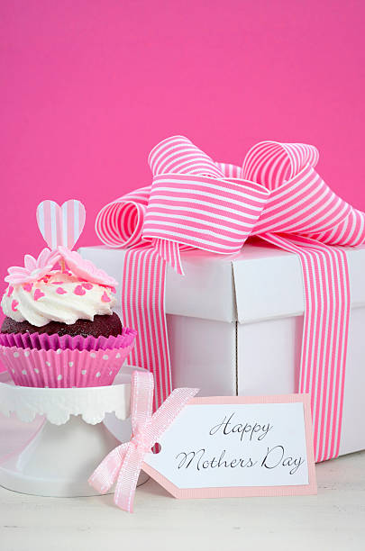 istock Happy Mothers Day pink and white cupcakes. 472328444