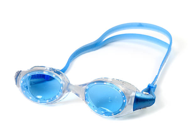 istock Blue goggles for swimming with water drops 472328580
