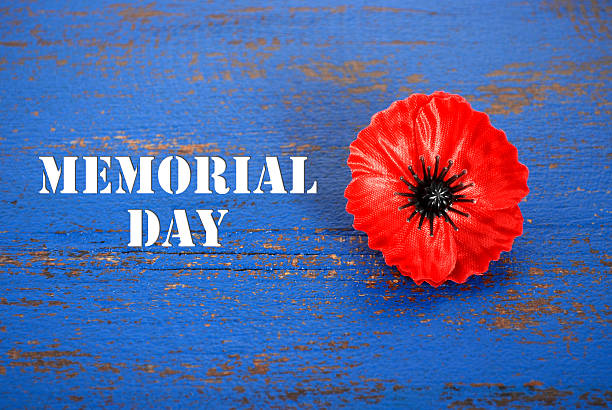 istock Poppy on memorial day background 472329182