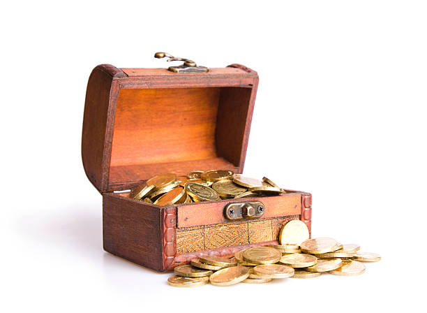 istock Wooden chest  filled with coins 472330558