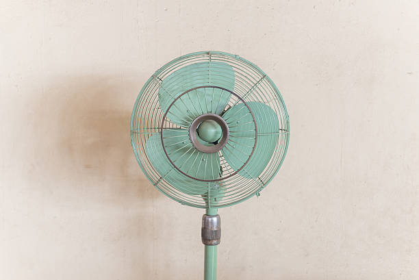 istock vintage old green fan 472333238