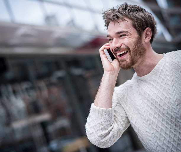 istock Casual man on the phone 472335852