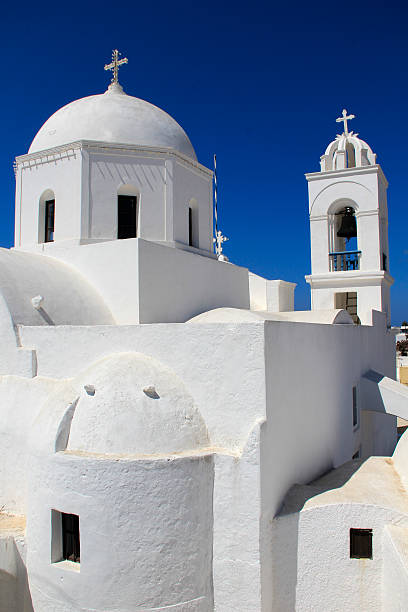 istock White Church in Megalochori, Santorini 472337476