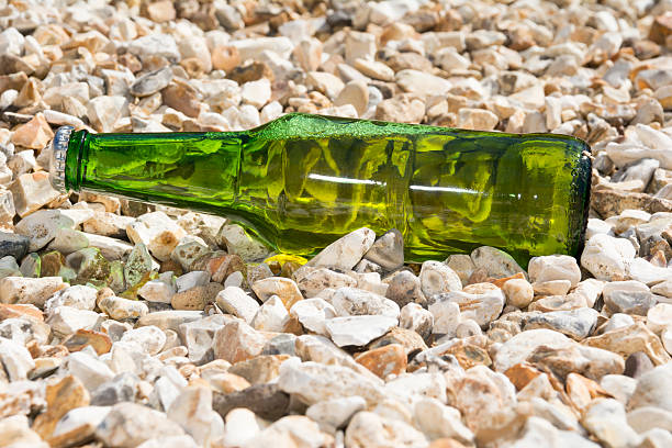 istock Cool Refreshing Beer In A Green Bottle 472337600
